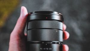 Preview wallpaper lens, black, hand, camera