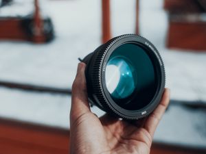 Preview wallpaper lens, hand, optics, camera