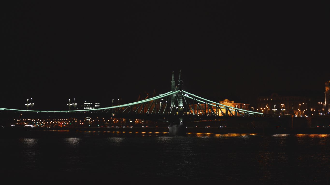 1366x768 Wallpaper liberty bridge, bridge, lights, river, budapest, hungary, night
