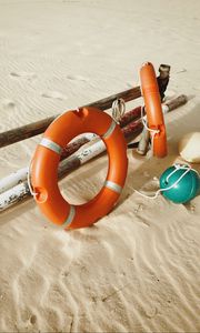 Preview wallpaper lifebuoy, beach, sand