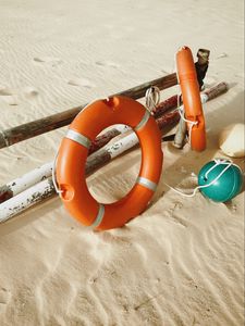 Preview wallpaper lifebuoy, beach, sand