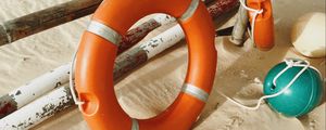 Preview wallpaper lifebuoy, beach, sand