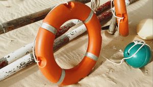 Preview wallpaper lifebuoy, beach, sand