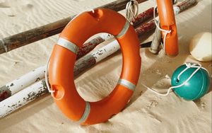 Preview wallpaper lifebuoy, beach, sand