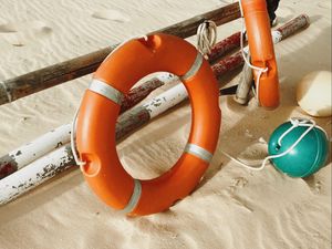 Preview wallpaper lifebuoy, beach, sand