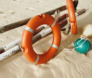 Preview wallpaper lifebuoy, beach, sand