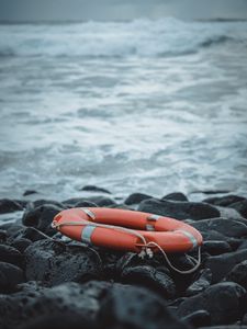 Preview wallpaper lifebuoy, sea, shore, stones, waves