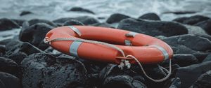 Preview wallpaper lifebuoy, sea, shore, stones, waves