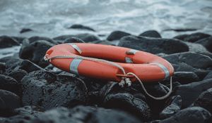 Preview wallpaper lifebuoy, sea, shore, stones, waves