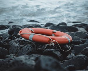 Preview wallpaper lifebuoy, sea, shore, stones, waves