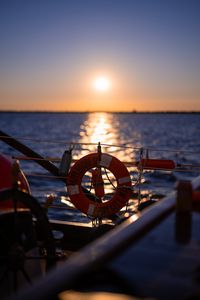 Preview wallpaper lifebuoy, sea, sunset, blur