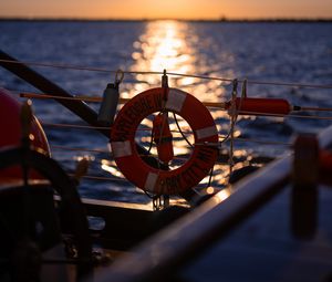 Preview wallpaper lifebuoy, sea, sunset, blur