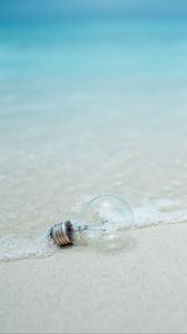 Preview wallpaper light bulb, beach, water, waves, sand