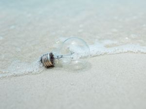 Preview wallpaper light bulb, beach, water, waves, sand