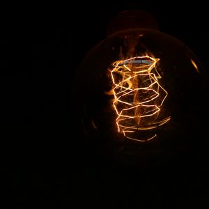Preview wallpaper light bulb, electricity, spiral, dark