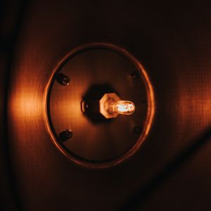 Preview wallpaper light bulb, glow, dark, metallic