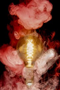 Preview wallpaper light bulb, glow, smoke, darkness