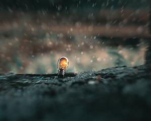 Preview wallpaper light bulb, glow, snow, focus