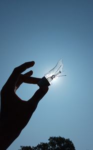 Preview wallpaper light bulb, hand, broken, sky