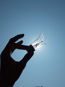 Preview wallpaper light bulb, hand, broken, sky