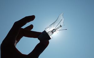 Preview wallpaper light bulb, hand, broken, sky