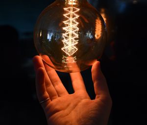 Preview wallpaper light bulb, hand, touch, light, glow