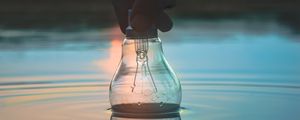 Preview wallpaper light bulb, hand, water, wet, waves