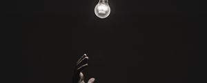 Preview wallpaper light bulb, hands, dark, lighting