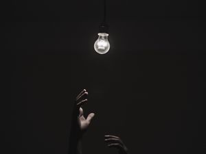 Preview wallpaper light bulb, hands, dark, lighting