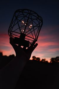 Preview wallpaper light bulb, lantern, hand, dark, dusk