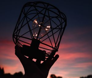 Preview wallpaper light bulb, lantern, hand, dark, dusk