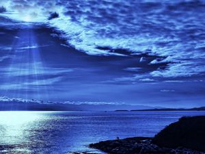 Preview wallpaper light, sky, beams, clouds, from above, dark blue, evening, sea, people