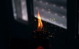 Preview wallpaper lighter, flame, sparks, dark