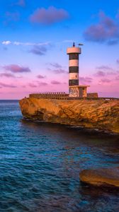 Preview wallpaper lighthouse, bay, sea, rocks, sunrise, spain