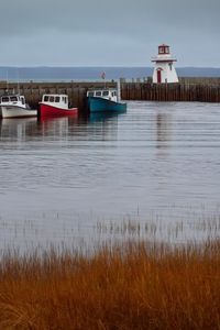 Preview wallpaper lighthouse, boats, sea, pier