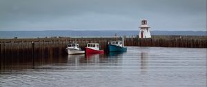 Preview wallpaper lighthouse, boats, sea, pier