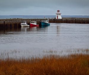 Preview wallpaper lighthouse, boats, sea, pier