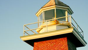 Preview wallpaper lighthouse, bricks, building, roof, tiles