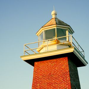 Preview wallpaper lighthouse, bricks, building, roof, tiles