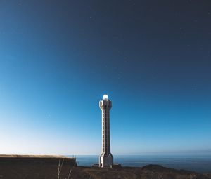 Preview wallpaper lighthouse, building, architecture, coast, night