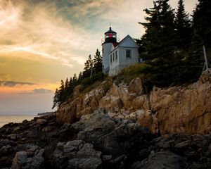 Preview wallpaper lighthouse, building, cliffs, sea, dusk