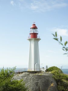 Preview wallpaper lighthouse, building, coast, sea, horizon