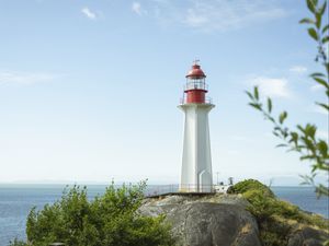 Preview wallpaper lighthouse, building, coast, sea, horizon