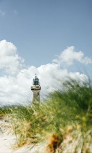 Preview wallpaper lighthouse, building, grasses, coast, sky