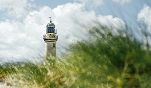 Preview wallpaper lighthouse, building, grasses, coast, sky