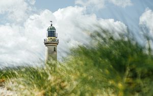 Preview wallpaper lighthouse, building, grasses, coast, sky