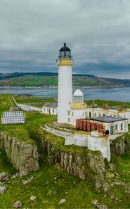 Preview wallpaper lighthouse, building, island, sea, coast