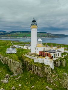 Preview wallpaper lighthouse, building, island, sea, coast