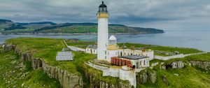 Preview wallpaper lighthouse, building, island, sea, coast