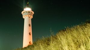 Preview wallpaper lighthouse, building, light, night, grass